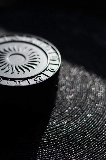 Black Zodiac Chart on a Table